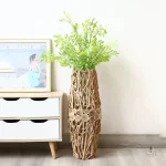 Vase élégant avec éléments en bois flotté