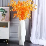Vase décoratif blanc au style minimaliste
