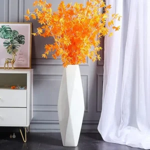 Vase décoratif blanc au style minimaliste