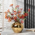 Vase doré tendance, accessoire de décoration incontournable