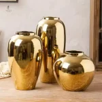 Grand vase doré, idéal pour fleurs ou plantes