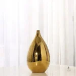 Vase doré de grande taille, accent décoratif chic