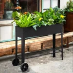 Jardinière noire sur pied élégante pour l'extérieur