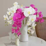 Orchidée artificielle élégante en fleurs synthétiques