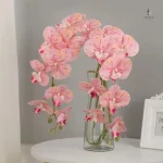 Composition florale d'orchidées artificielles modernes