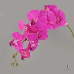 Arrangement floral d'orchidées en matières synthétiques