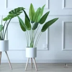 Pot de fleur métal sur pied élégant et moderne