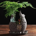 Pot de fleur avec motifs chinois classiques