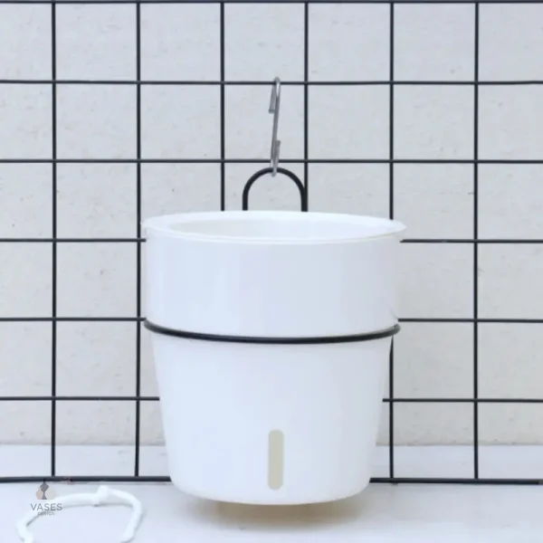 Pot de fleur avec système d'auto-arrosage