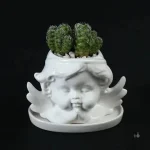 Vase ange décoratif en céramique élégante
