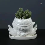 Vase en forme d'ange, design artistique pour la maison