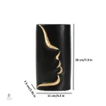 Vase en céramique avec motif de visage