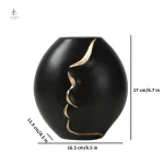 Vase visage original, ajout artistique
