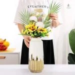 Vase blanc doré pour embellir votre espace