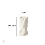 Accessoire décoratif blanc qui ajoute une touche moderne à votre espace