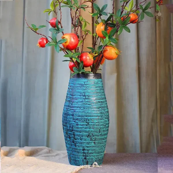 Vase en teinte bleu canard, ajout de couleur et style