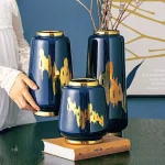 Vase bleu doré élégant pour décoration intérieure