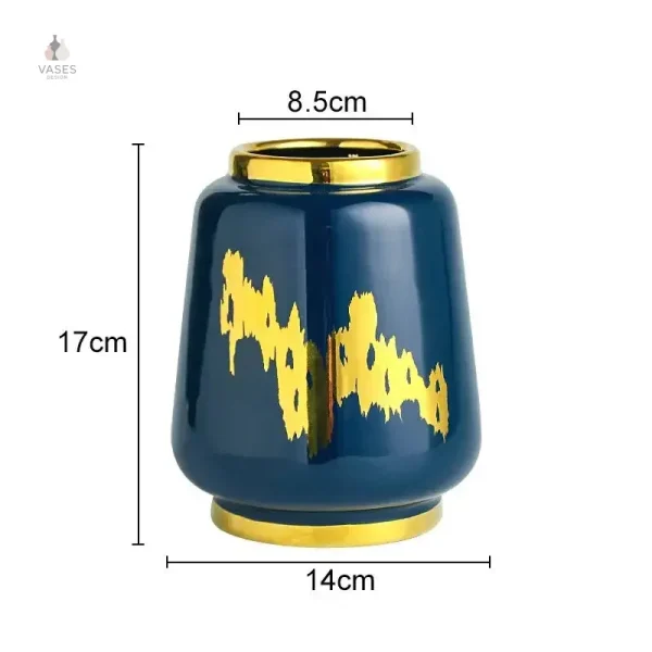 Vase bleu avec finition dorée, idéal pour fleurs