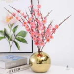 Vase boule doré, accessoire de style