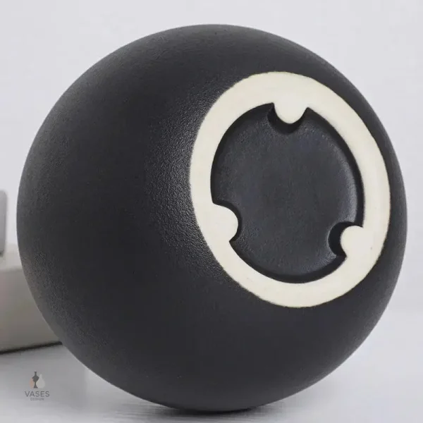 Vase boule en céramique, finition noir lustré