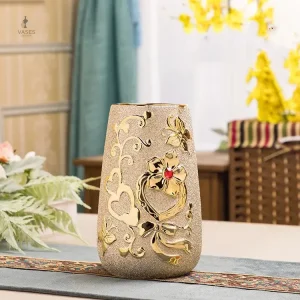 Accessoire décoratif en céramique dorée