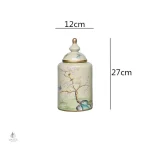 Vase traditionnel chinois illustré d'oiseaux