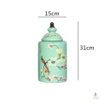 Vase en porcelaine ornée d'illustrations d'oiseaux