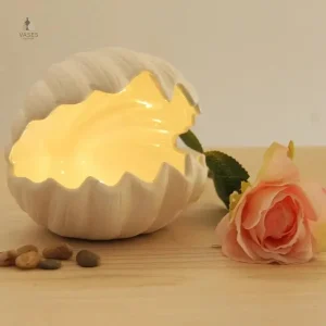 Vase coquillage doré élégant pour décoration intérieure