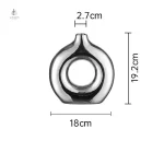 Vase argenté, essentiel pour un intérieur moderne