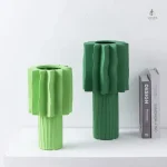 Vase design vert pour un intérieur moderne