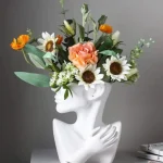 Vase visage original pour fleurs et plantes