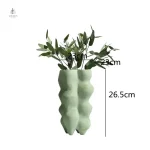 Vase design unique en couleur verte