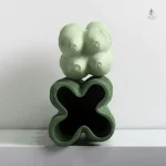 Vase design épuré en vert