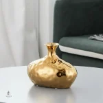 Vase doré chic pour embellir votre espace
