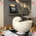 Vase décoratif en forme de coquillage, style unique