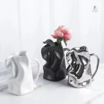 Vase original en forme de cruche pour fleurs
