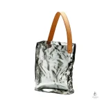 Vase en céramique au design sac à main