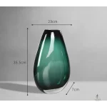 Vase en verre vert pour arrangements floraux