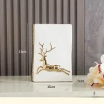 Vase décoratif avec cerf et forme de livre