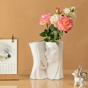 Vase livre avec visage décoratif en céramique