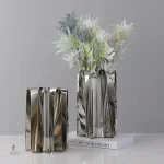 Vase métal contemporain, parfait pour un style minimaliste