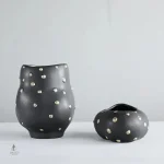 Vase en céramique noir et or pour décoration
