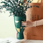 Vase artistique en forme de visage, style moderne