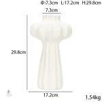 Vase fonctionnel pour exposer des fleurs