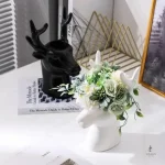 Vase stylisé en forme de tête de cerf