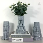 Vase sculpté en forme de tête artistique