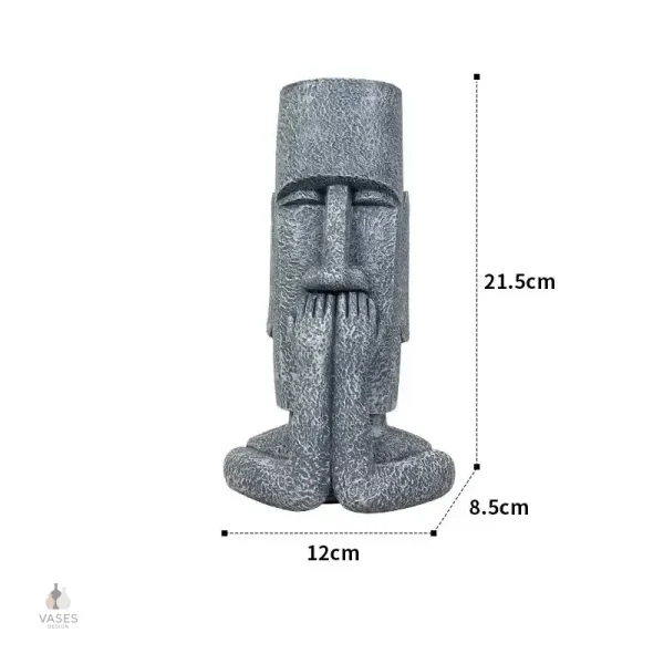 Vase décoratif avec motif de visage stylisé
