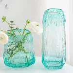 Vase vert transparent élégant pour décoration intérieure