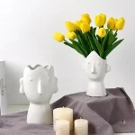 Vase visage blanc pour décoration intérieure