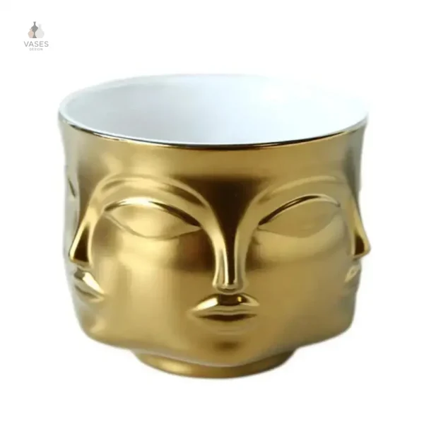 Vase en céramique avec motif visage